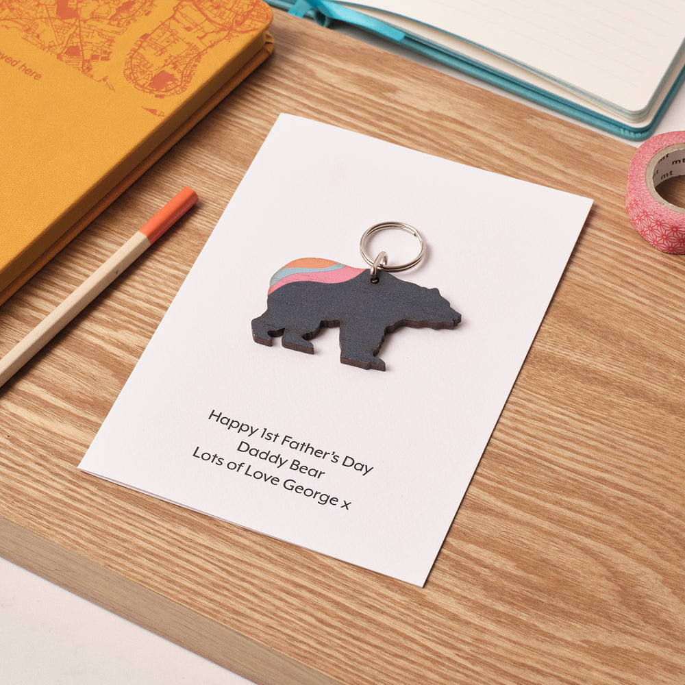 Midnight blue bear keyring with pink and turquoise accents, presented on white card with heartfelt Father's Day message.