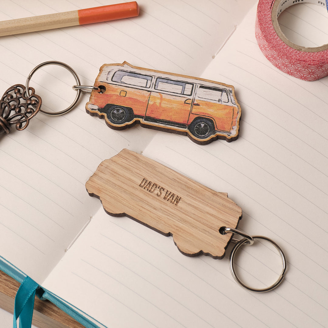 Wooden classic VW campervan gift keychain with 'Dad's Van' engraving on a notebook page. Treat Dad to an upgrade perfect birthday, Christmas or fathers day gift for him.