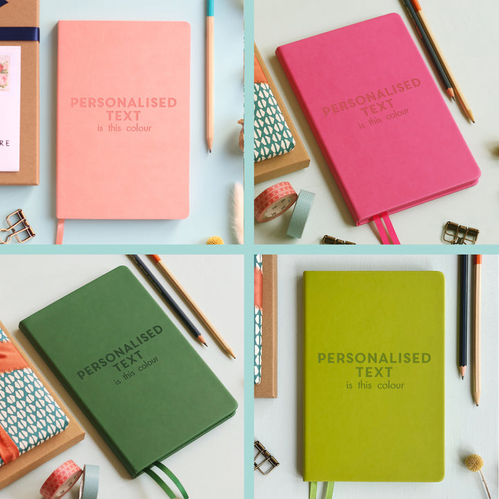 An image split into quarters. Each quarter contains a notebook image showing how the notebook will engrave in that colour.