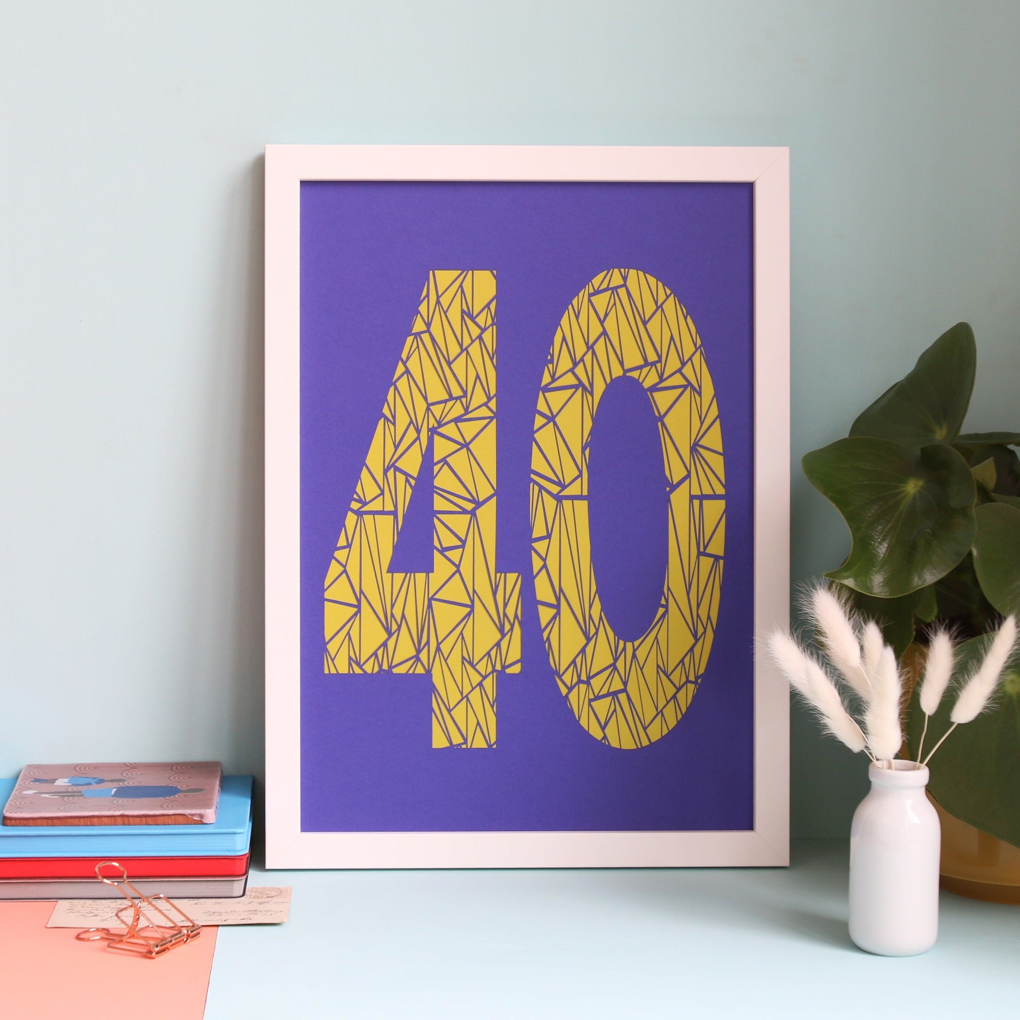 Framed geometric number 40 papercut in purple and yellow colourways
