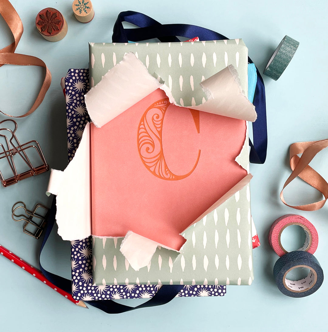 A half unwrapped personalised journal