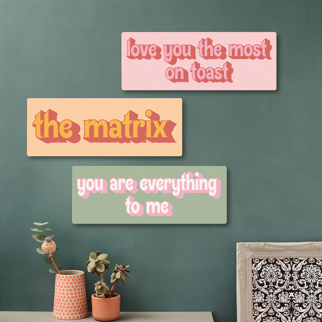 Three vibrant personalised printed motivational signs or quotes on a wall with decorative elements, perfect for Kitchen decor or a teenager bedroom gift.
