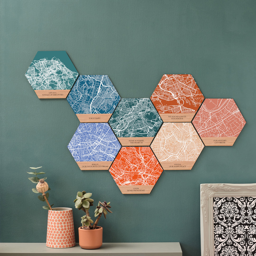 8 vibrant colour map tiles of different personalised special travel locations creating a unique wall art gift for maximalist renter friendly hangings.