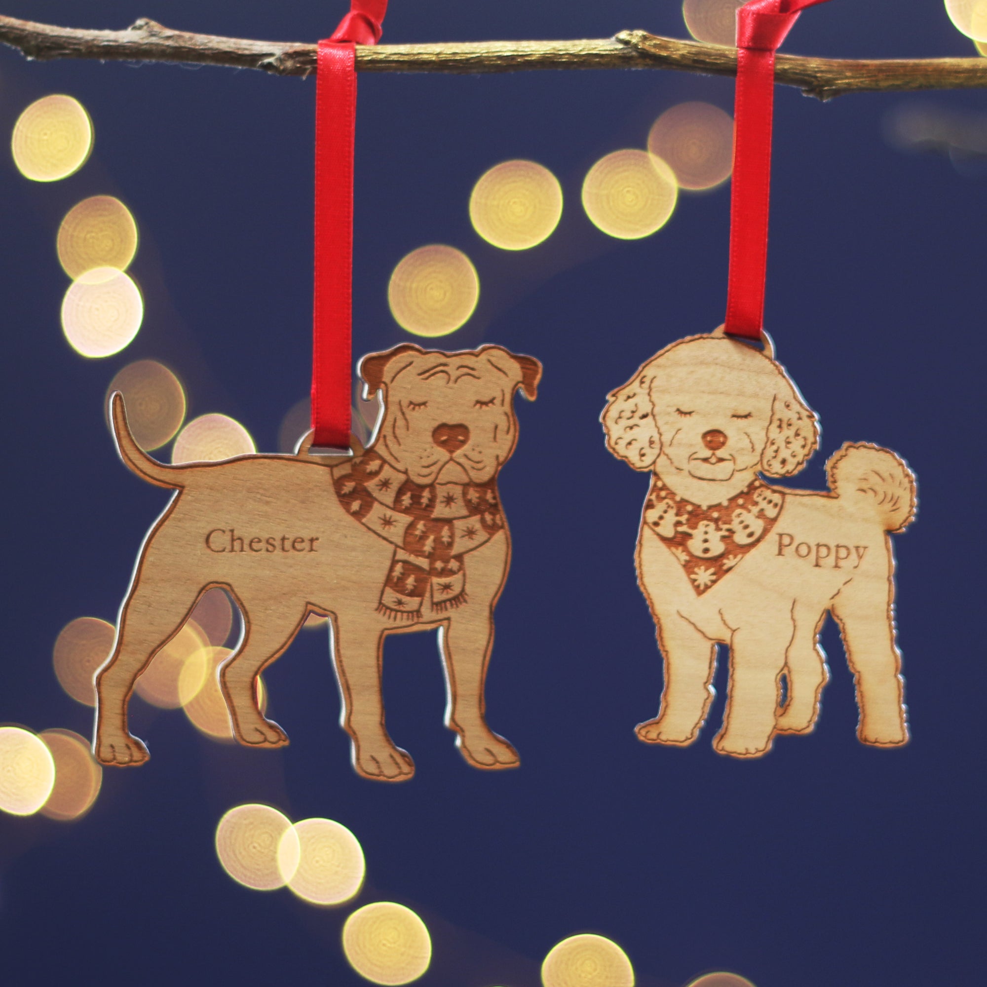 Two wooden dog Christmas tree laser-cut ornaments of a Whippet, greyhound, hound dog lovers gift. Alongside a Westie, Cairn, Scottish, Terrier, or Miniature Schnauzer, with personalized names for pet owners secret santa or stocking filler gift.