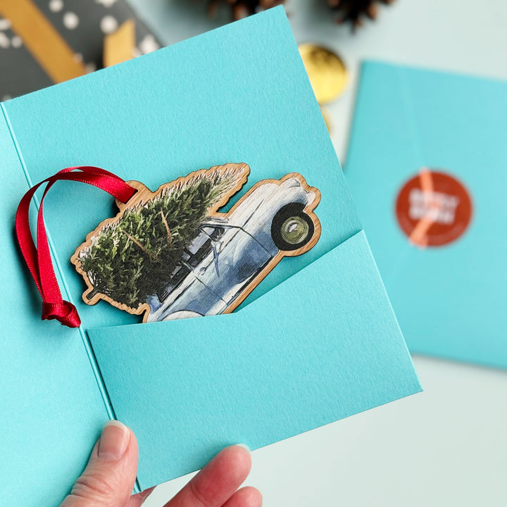An example of a car decoration in a gift sleeve.