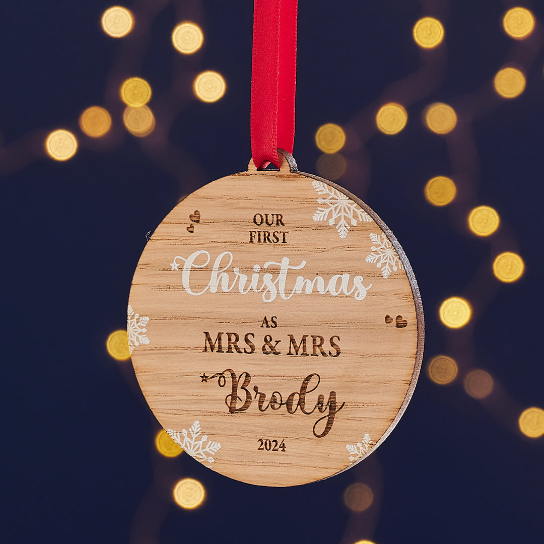 Wooden first Christmas together keepsake bauble with ribbon.