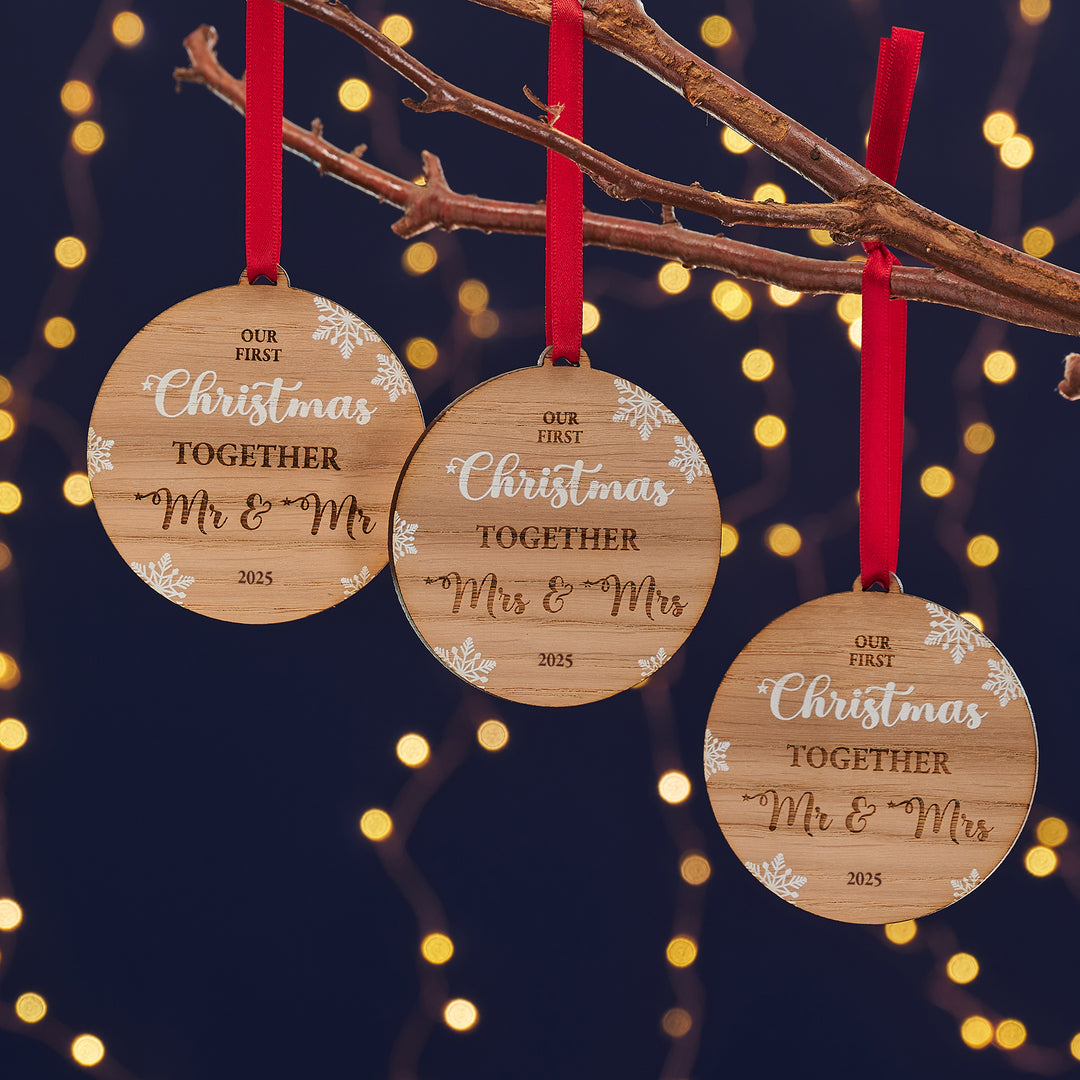 Custom engraved Christmas decoration for newlyweds or partners.