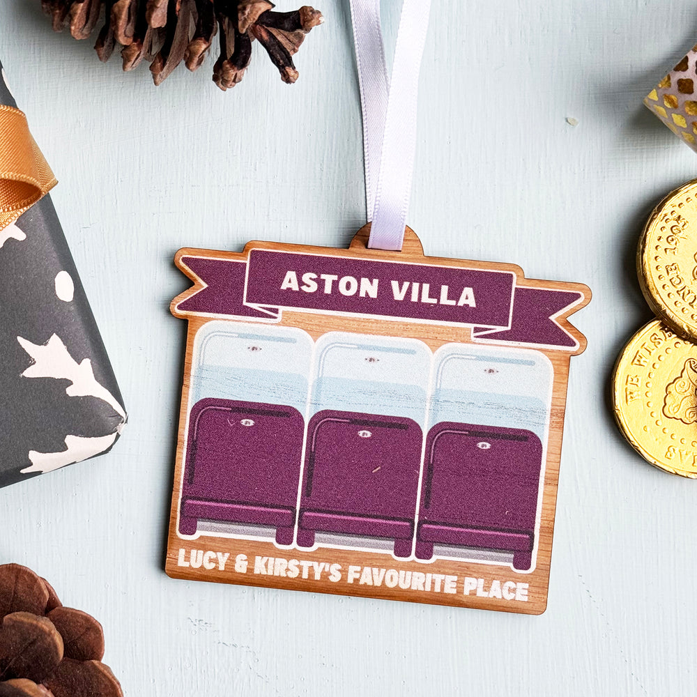 Sports-themed Christmas decoration with rugby or football stadium seating, stocking filler and team gifts.
