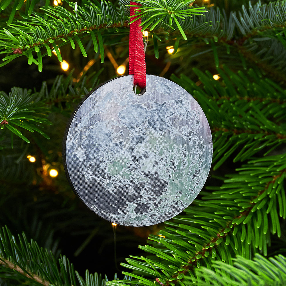 Personalised moon Christmas decoration with red ribbon hanger.