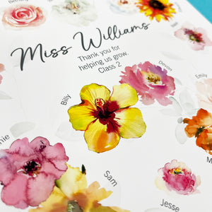 A close-up of a teacher appreciation print featuring watercolor flowers and student names, with the text "Miss Williams, Thank you for helping us grow. Class 2."