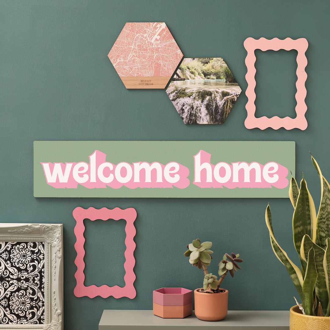 Mid-century inspired Welcome Home wall art in a cheerful colour palette