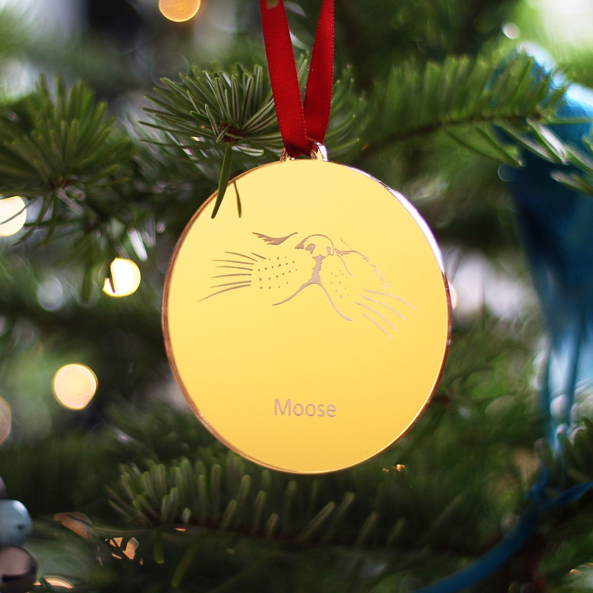 Gold mirror acrylic cat nose Christmas bauble with whisker engraving. Personalised with the cat's name.