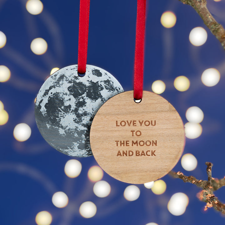Full moon Christmas tree ornament personalised with name and date.