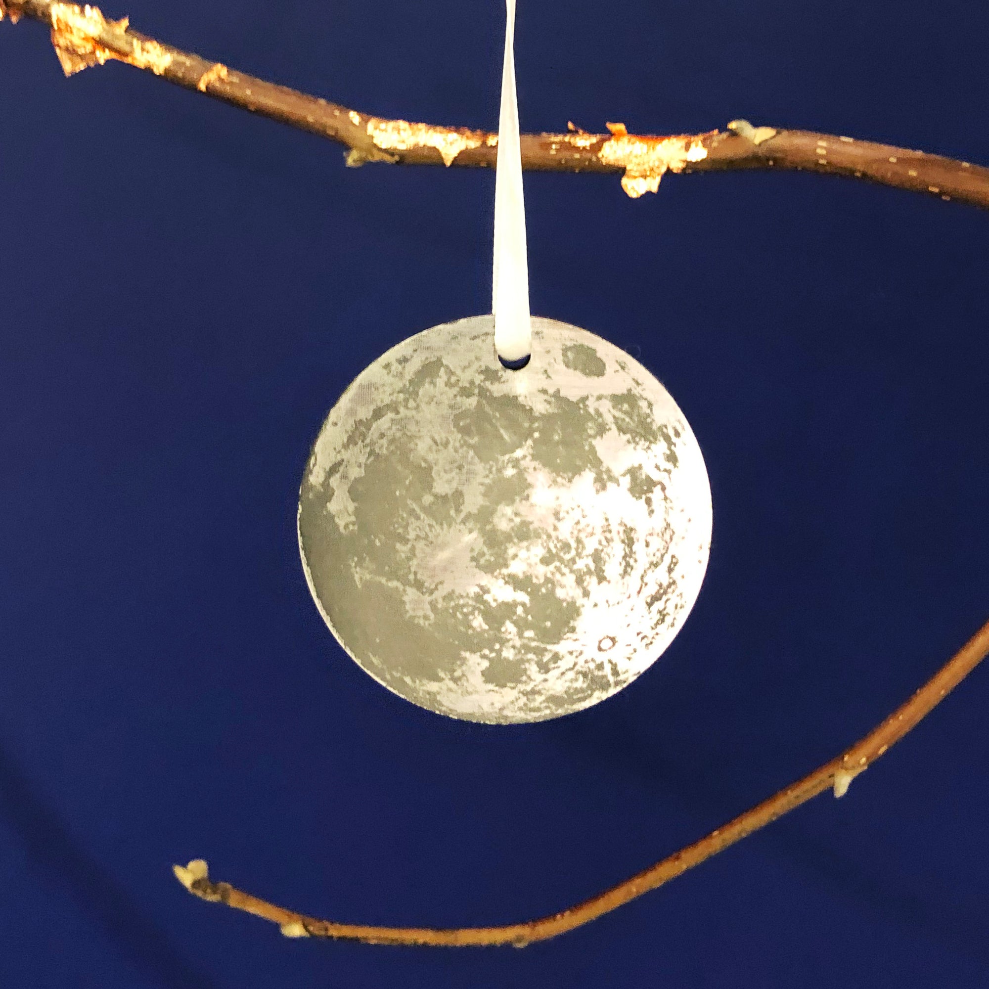 Gold moon Christmas tree ornament with custom engraved message.