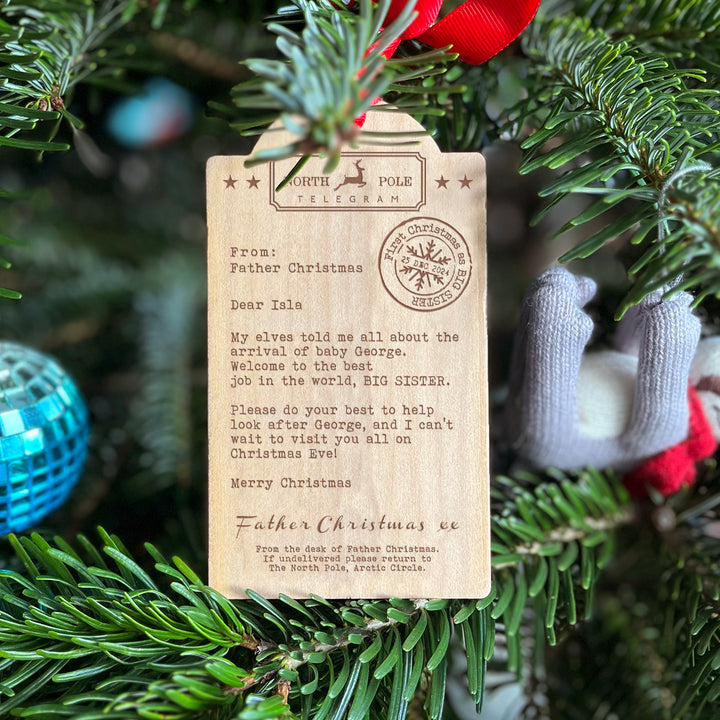 Big brother or big sister wooden Christmas tree decoration with engraved festive message.