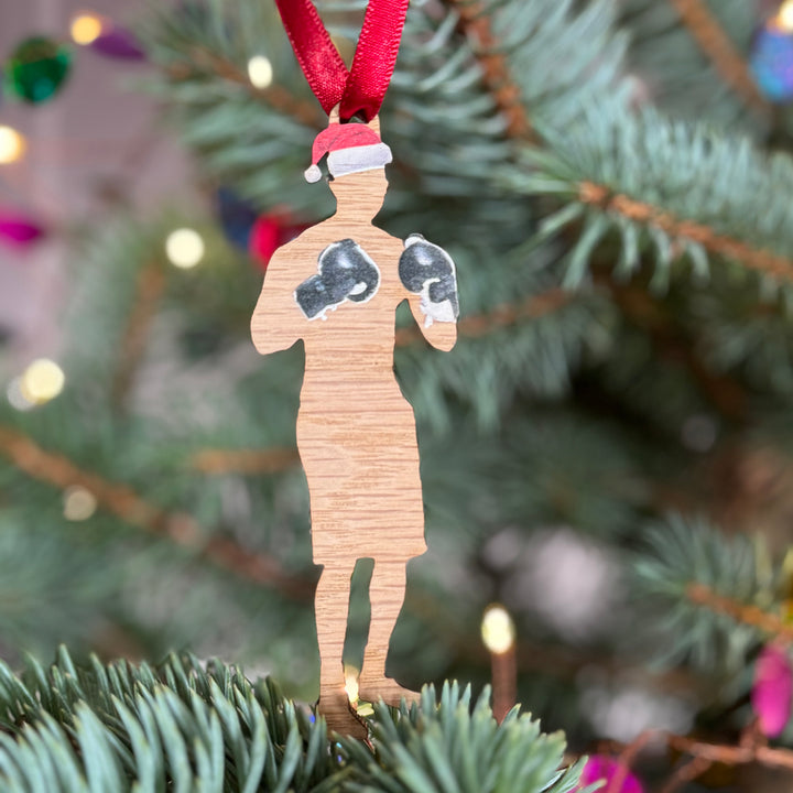Boxer boxing Christmas gift for him, wooden silhouette Christmas tree ornament with printed in the UK gloves and festive hat, hanging on a tree.