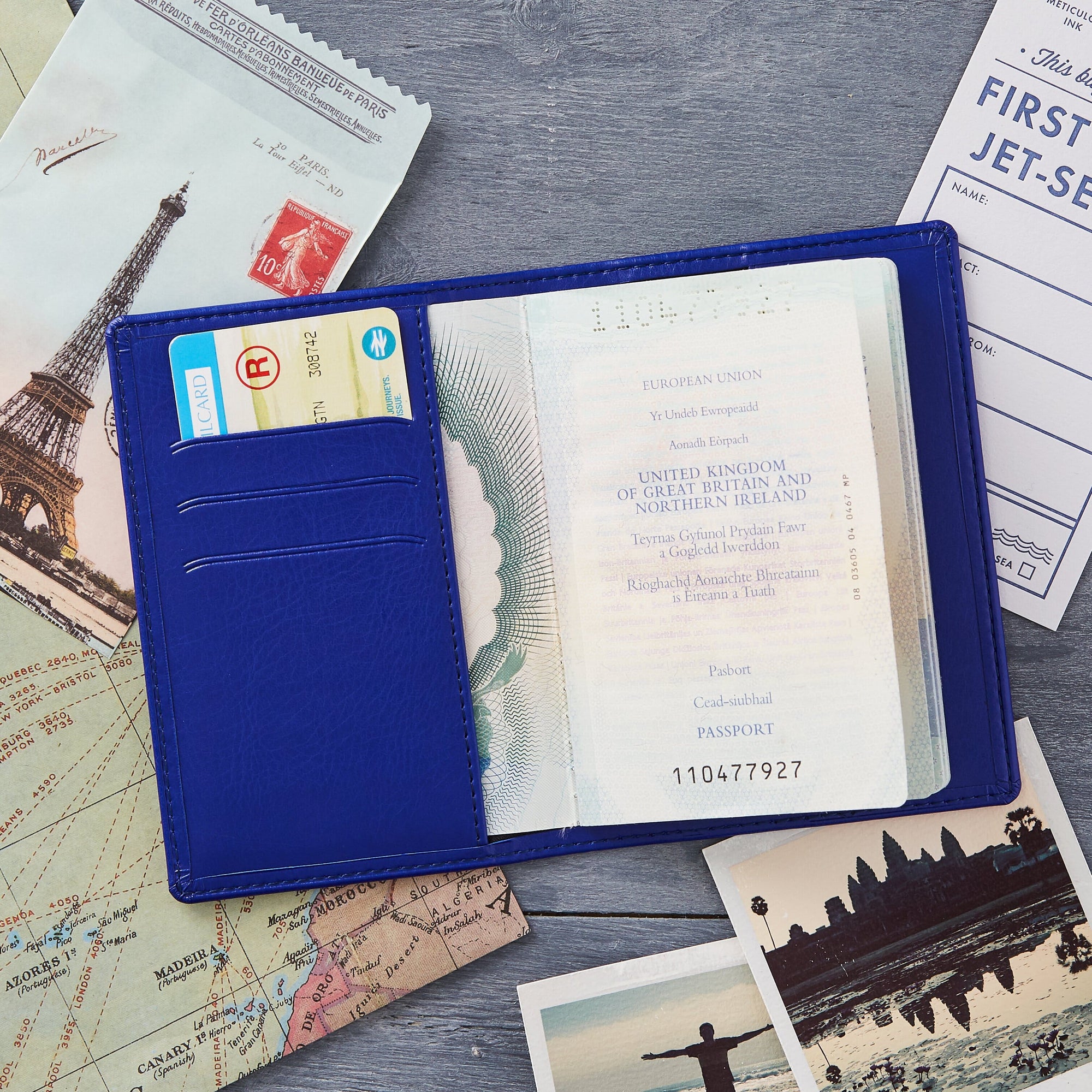 Inside of Royal Blue vegan leather passprt holder showing that it holds a standard sized passport