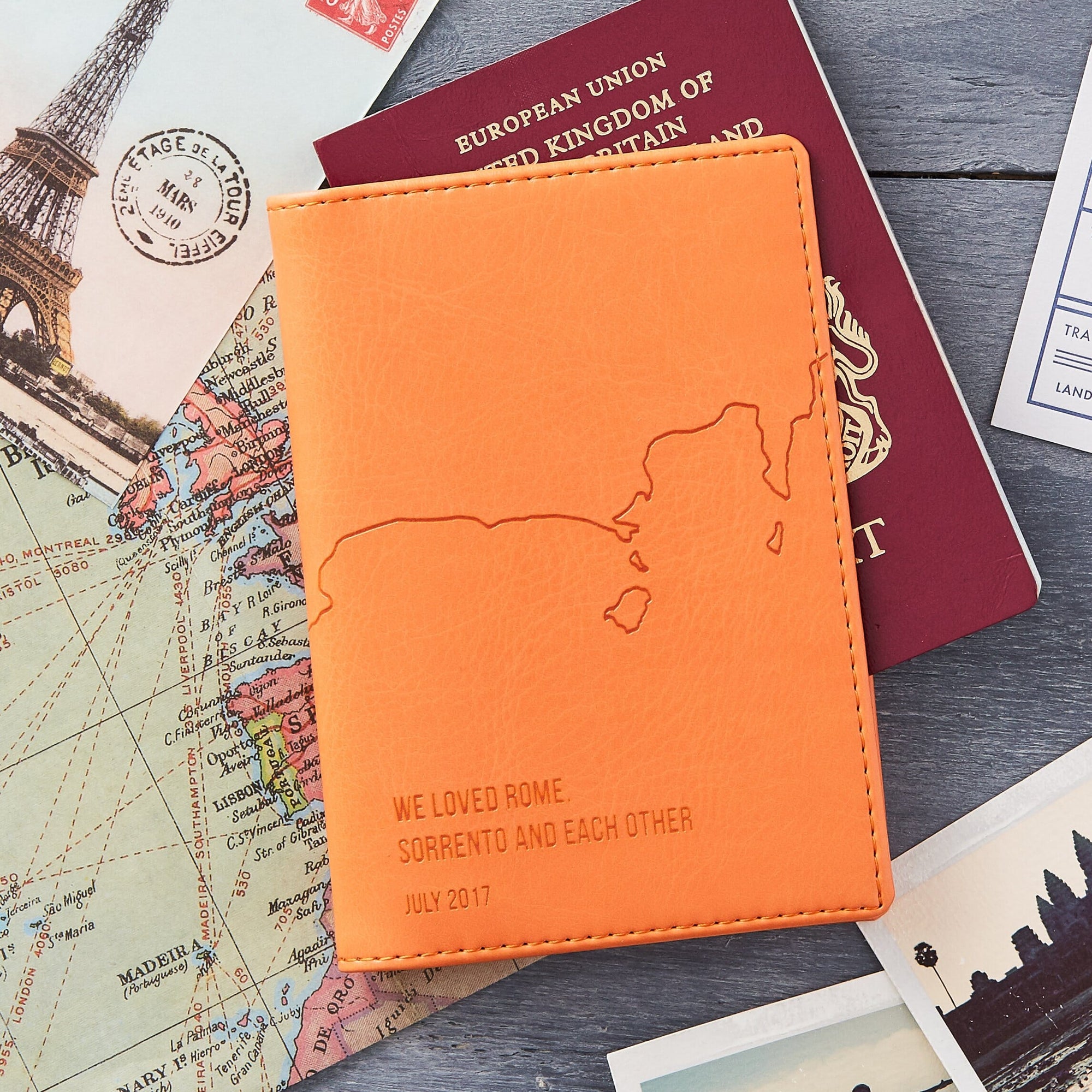 Pumpkin Orange passport wallet with engraved coastline
