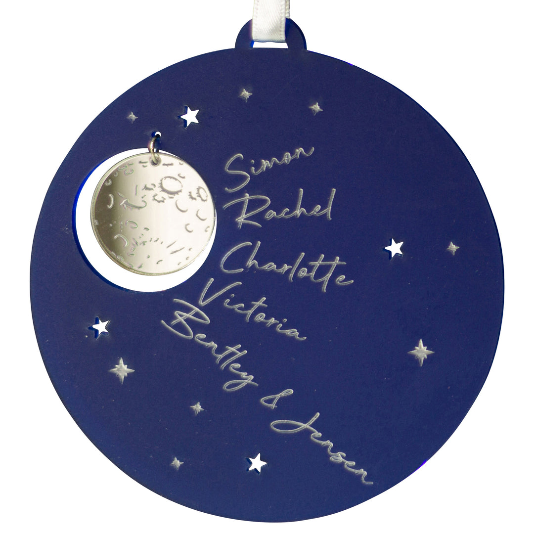 Custom engraved night sky Christmas ornament with family names.