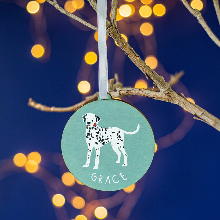 Personalised Dalmatian Christmas tree bauble with cute dog illustration and name.