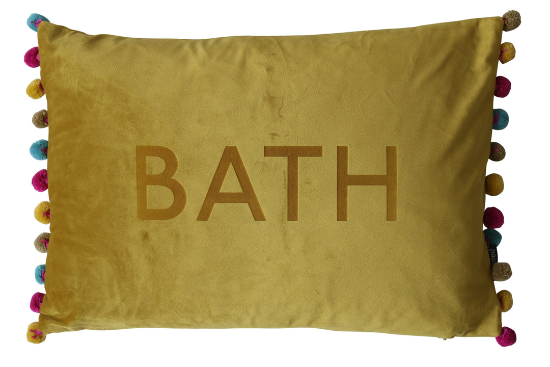 Bath university graduation student gift, a green pom pom cushion 