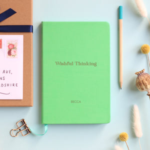 Green vegan leather notebook engraved  with wishful thinking and a name