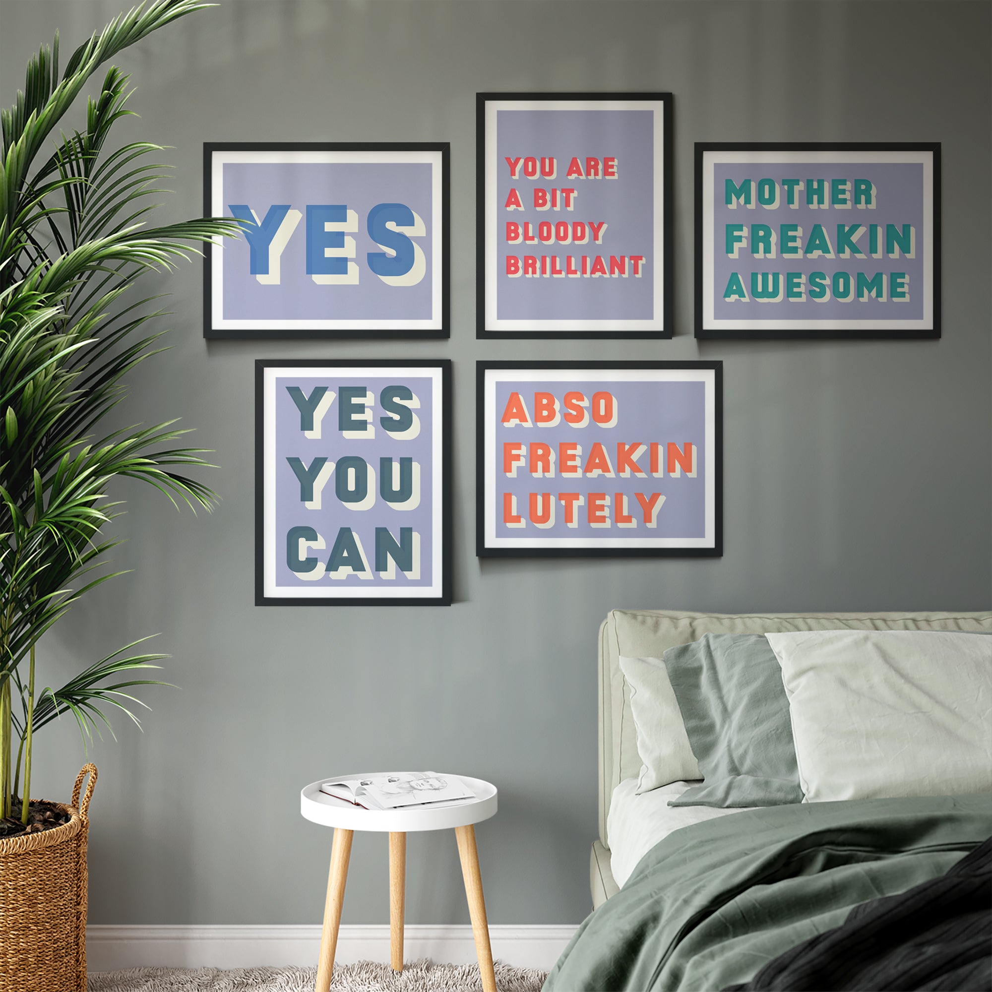 Group of framed colourful typographic statement prints
