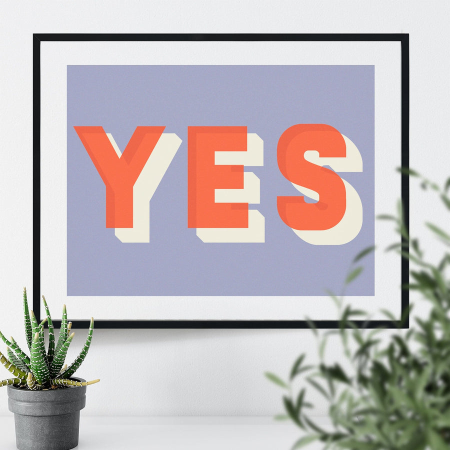 Colourful typographic print saying “Yes” 