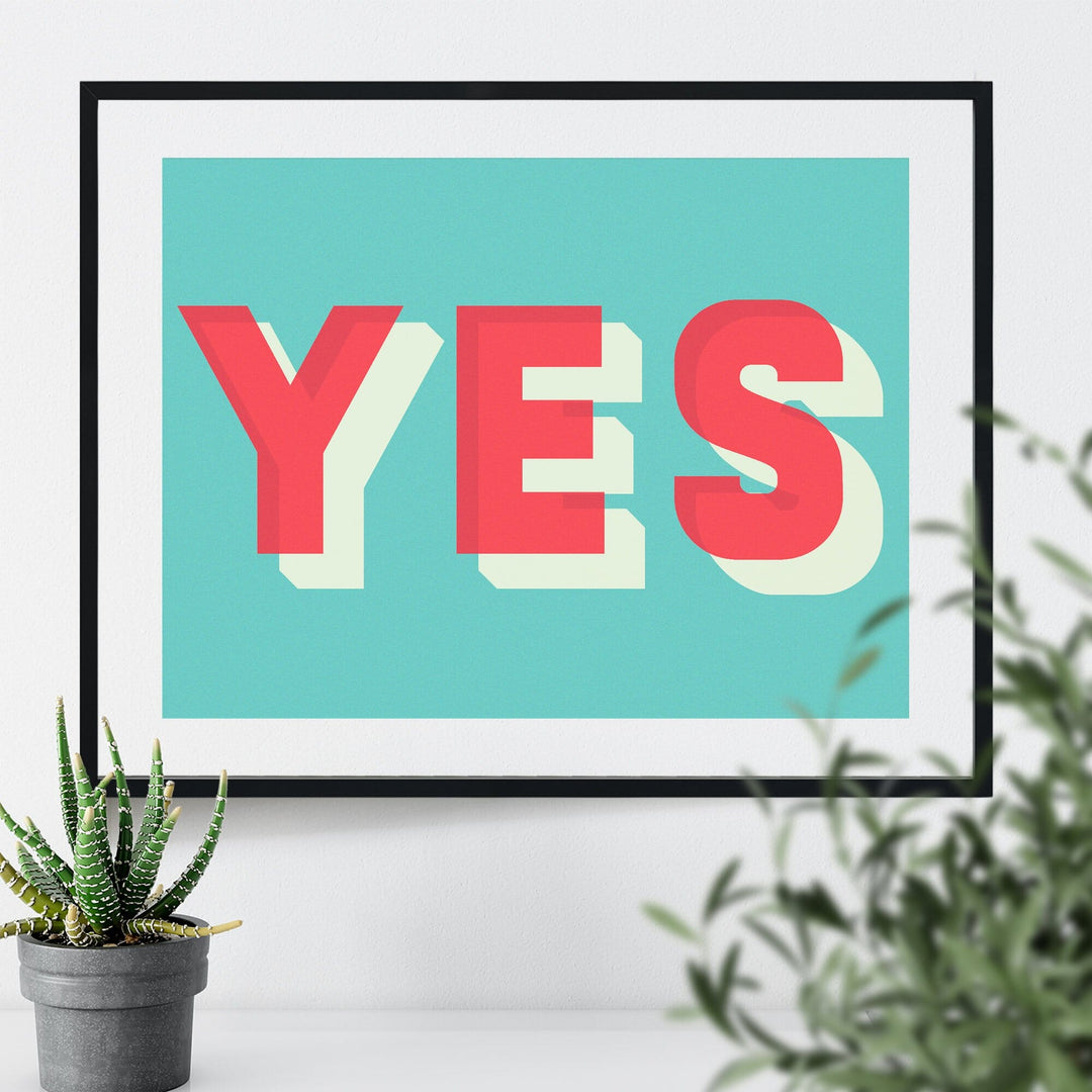 Colourful typographic print saying “Yes” 