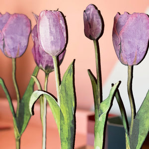 Close up of Wooden printed  tulips on a stand