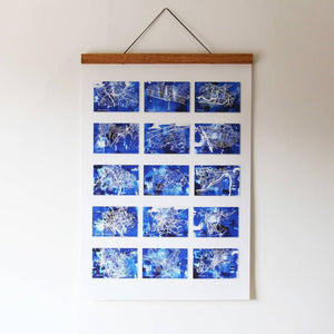 unframed print with 15 small blue maps of different locations