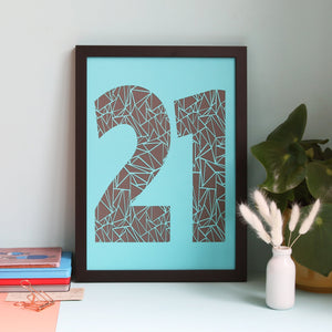 Framed geometric number 21 papercut in turquoise and brown colourways