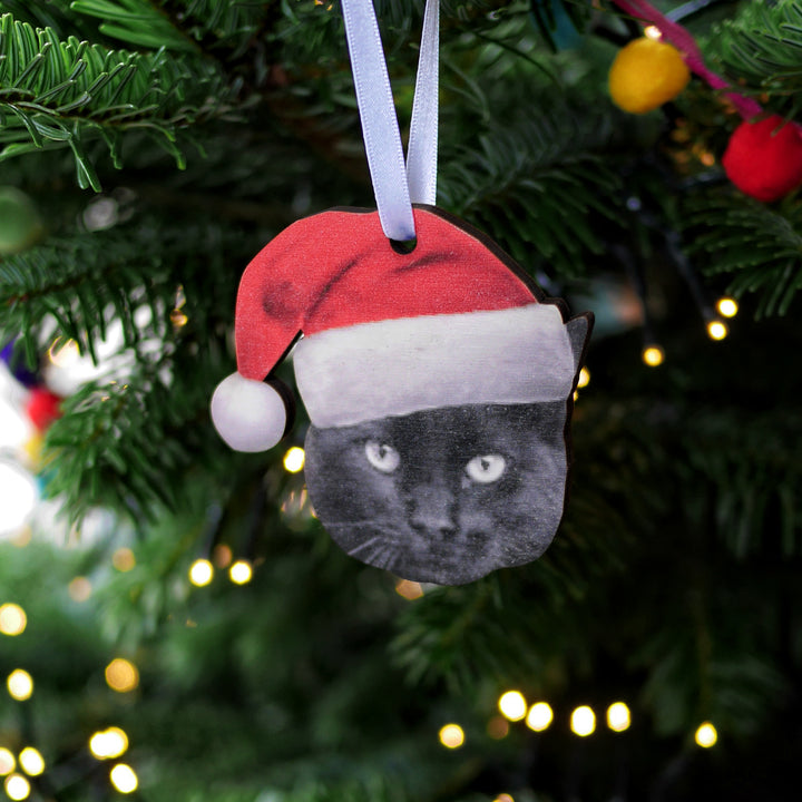 Engraved wooden Christmas bauble with cat face, rustic pet tree decoration