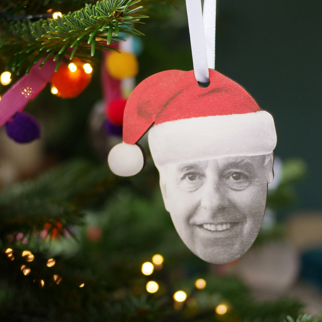 Personalised Christmas ornament with man wearing Santa hat, perfect Secret Santa gift.