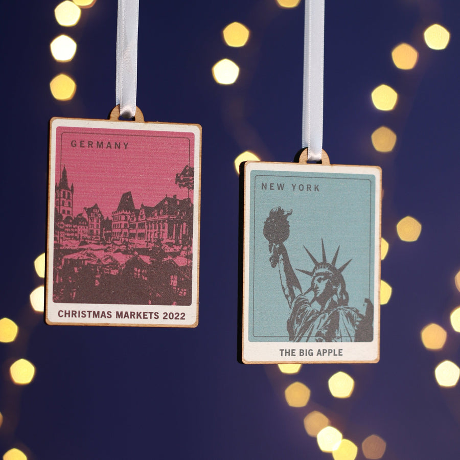 personalised Wooden Christmas decorations with a printed picture of a travel destination e.g New York, great for travel memories