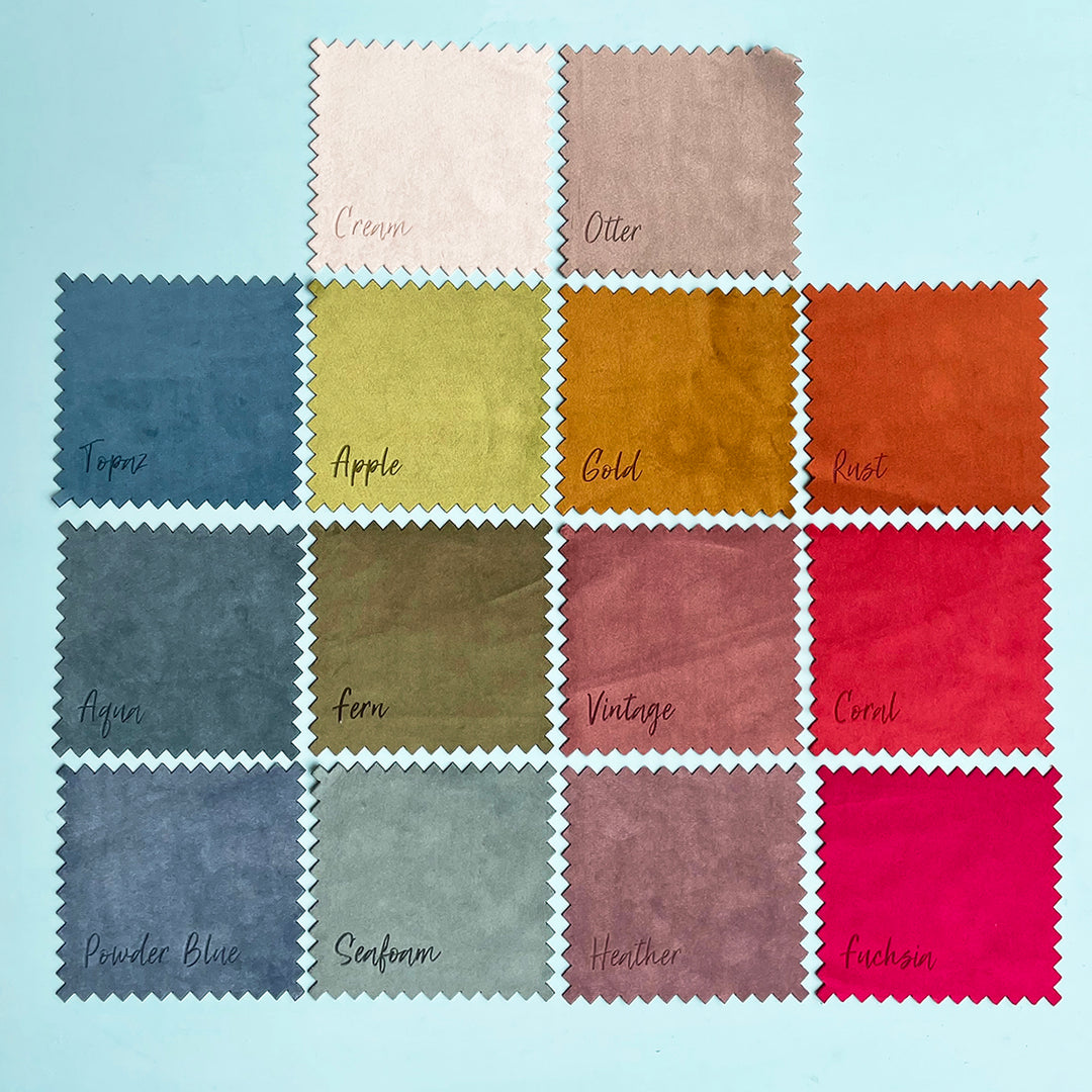 A color palette showing 16 fabric swatches in various colors and textures. The colors are named with nature-inspired terms like "Cream," "Otter," "Apple," and "Fern."